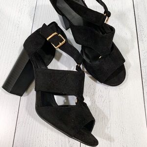 Strappy black suede heels